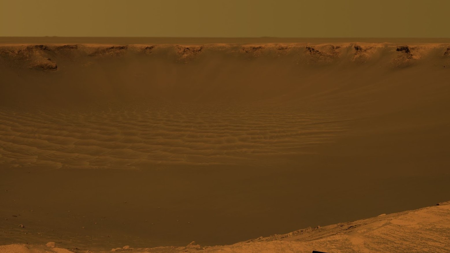 A close-up look on the surface of Mars of a crater impact.