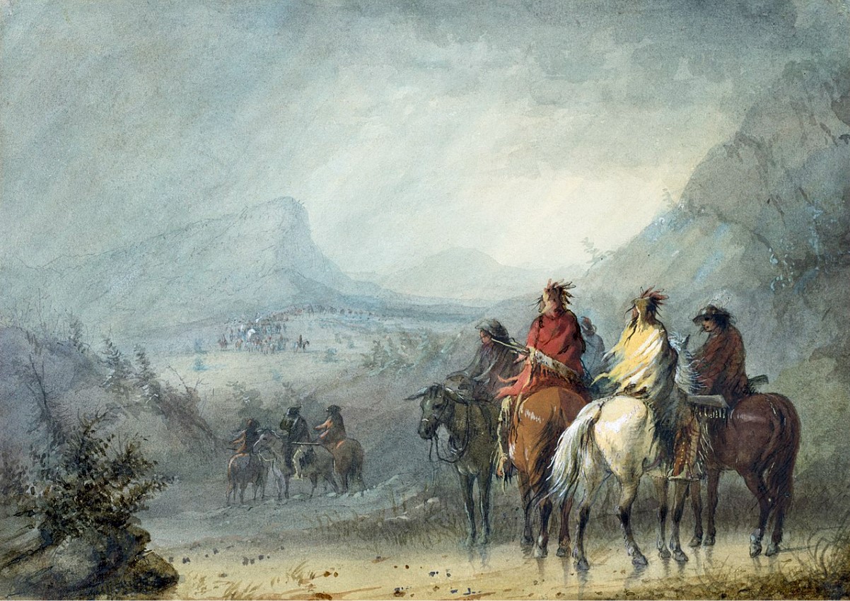 An image of several people traveling along the Oregon Trail on horseback