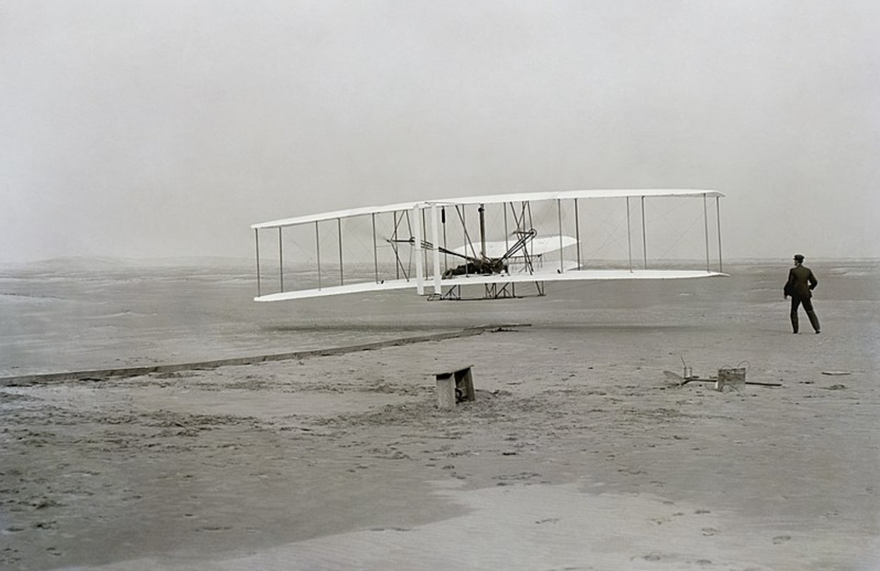 The first successful flight of the Wright Flyer, by the Wright brothers in North Carolina in 1903