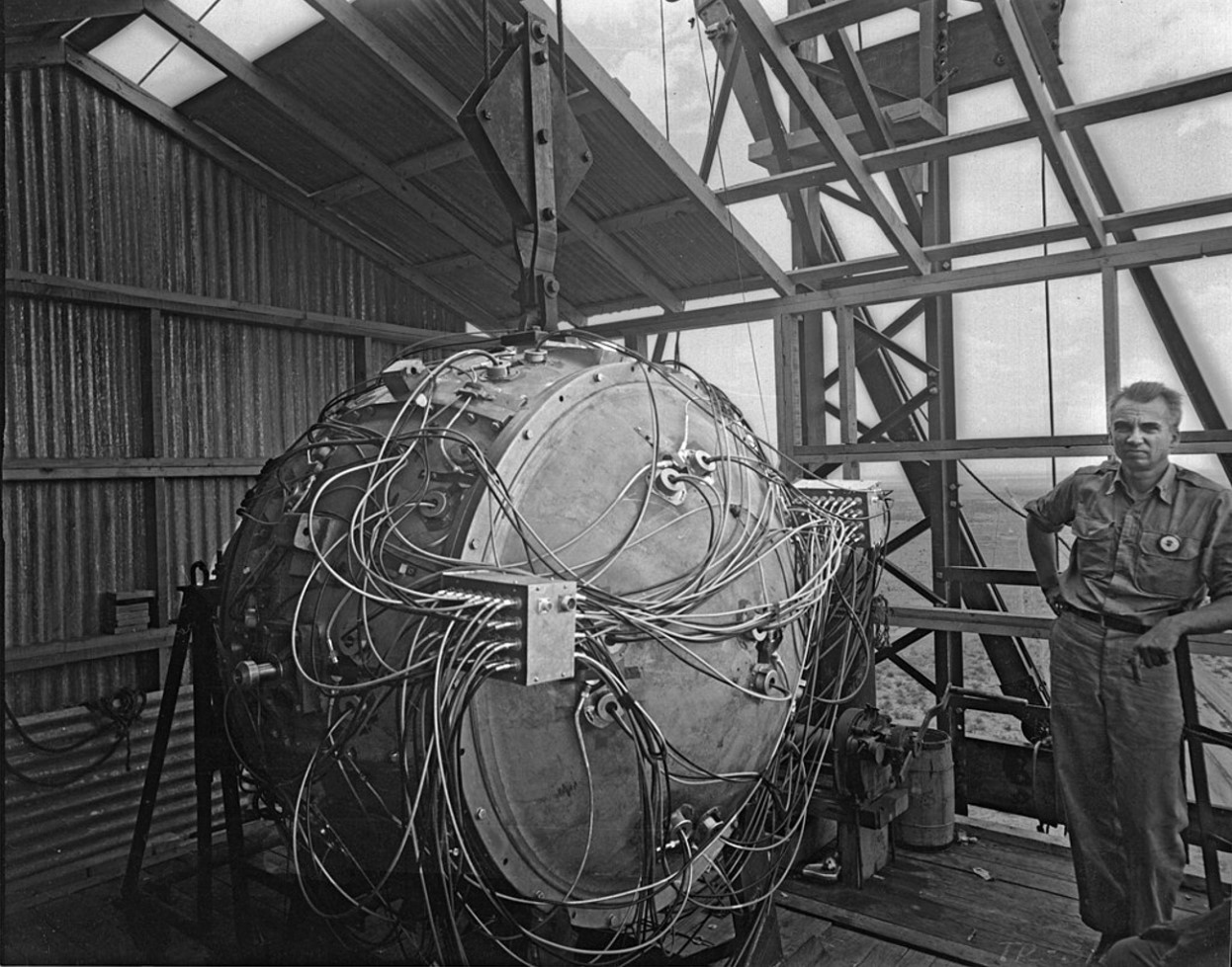 Norris Bradbury with the assembled bomb atop the test tower, 1945