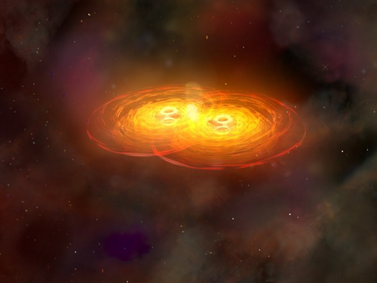 An image of two black holes merging in space