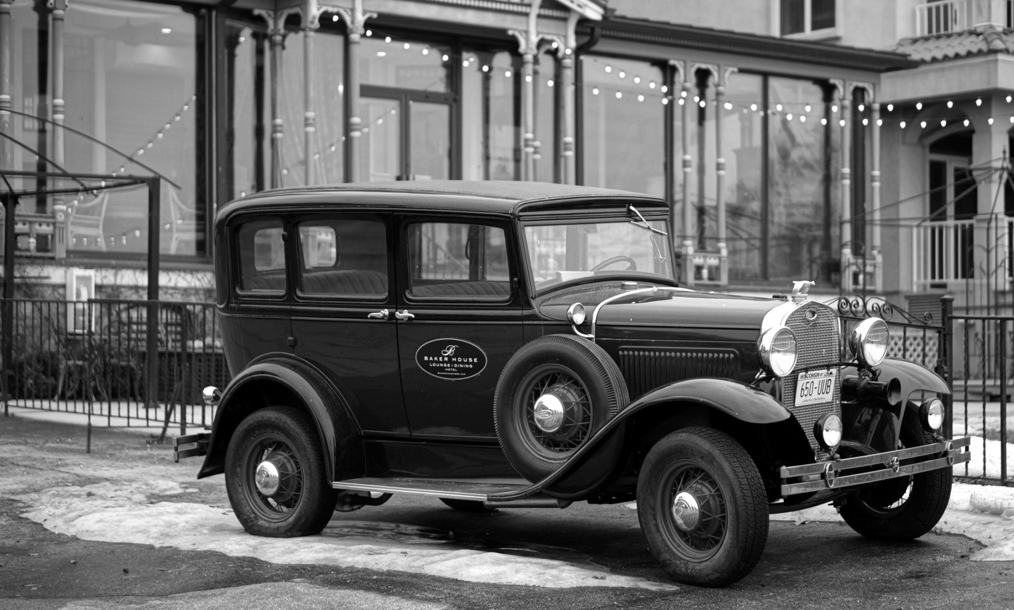 A photograph of an old car