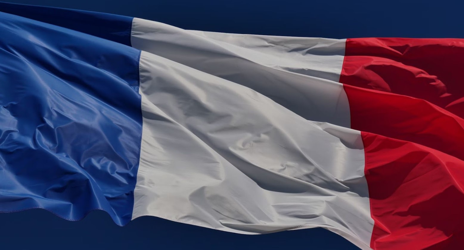 The French flag, which is slightly creased.