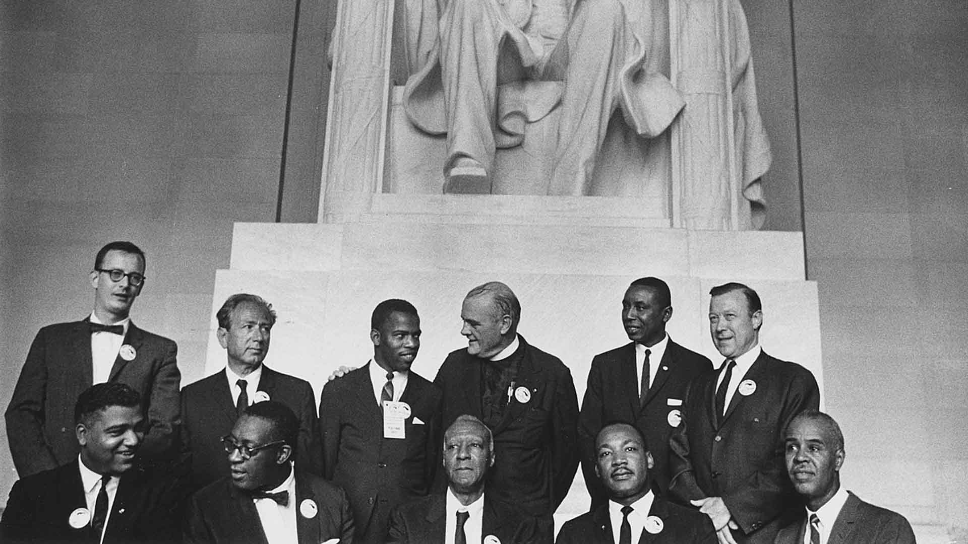 Leaders of the March on Washington posing in front of the Lincoln Memorial