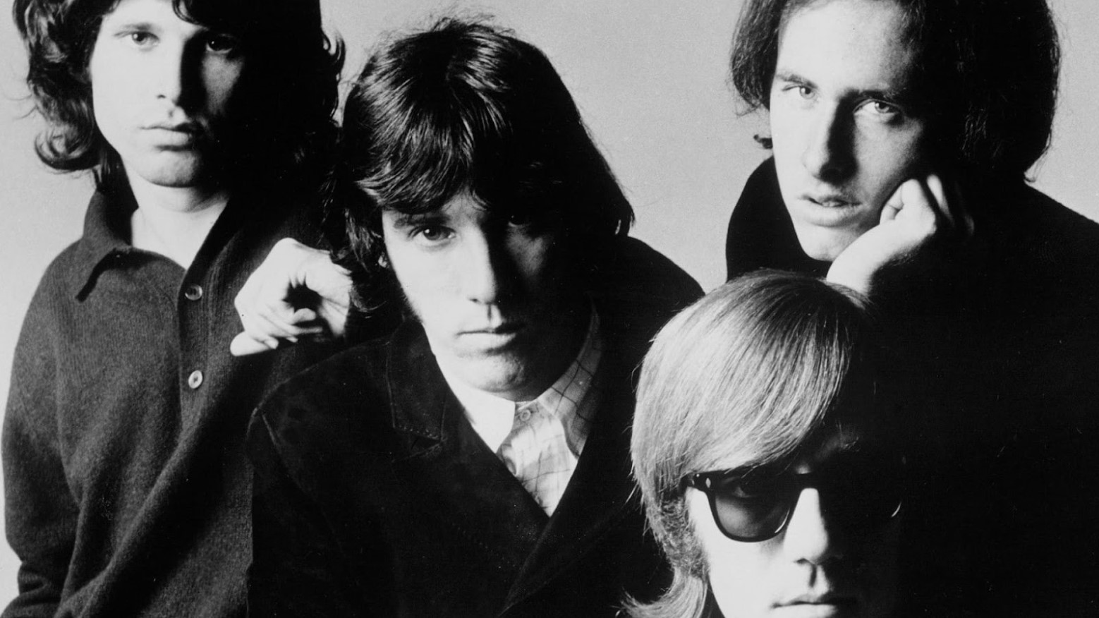 A black and white photo of the band The Doors in 1968.