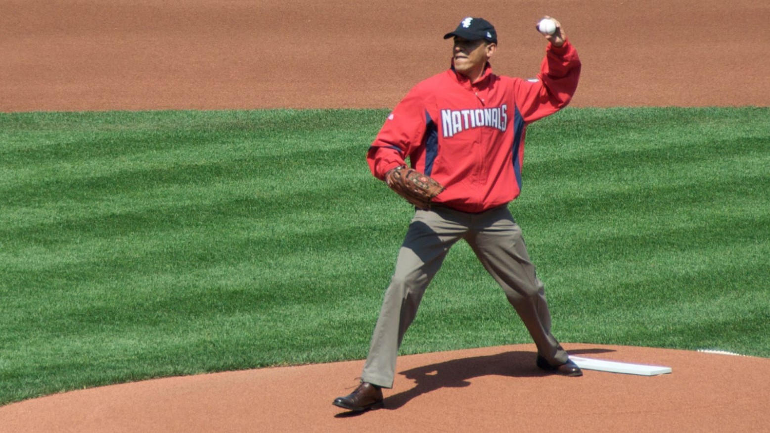 President Barack Obama throwing out the first baseball pitch in 2010.