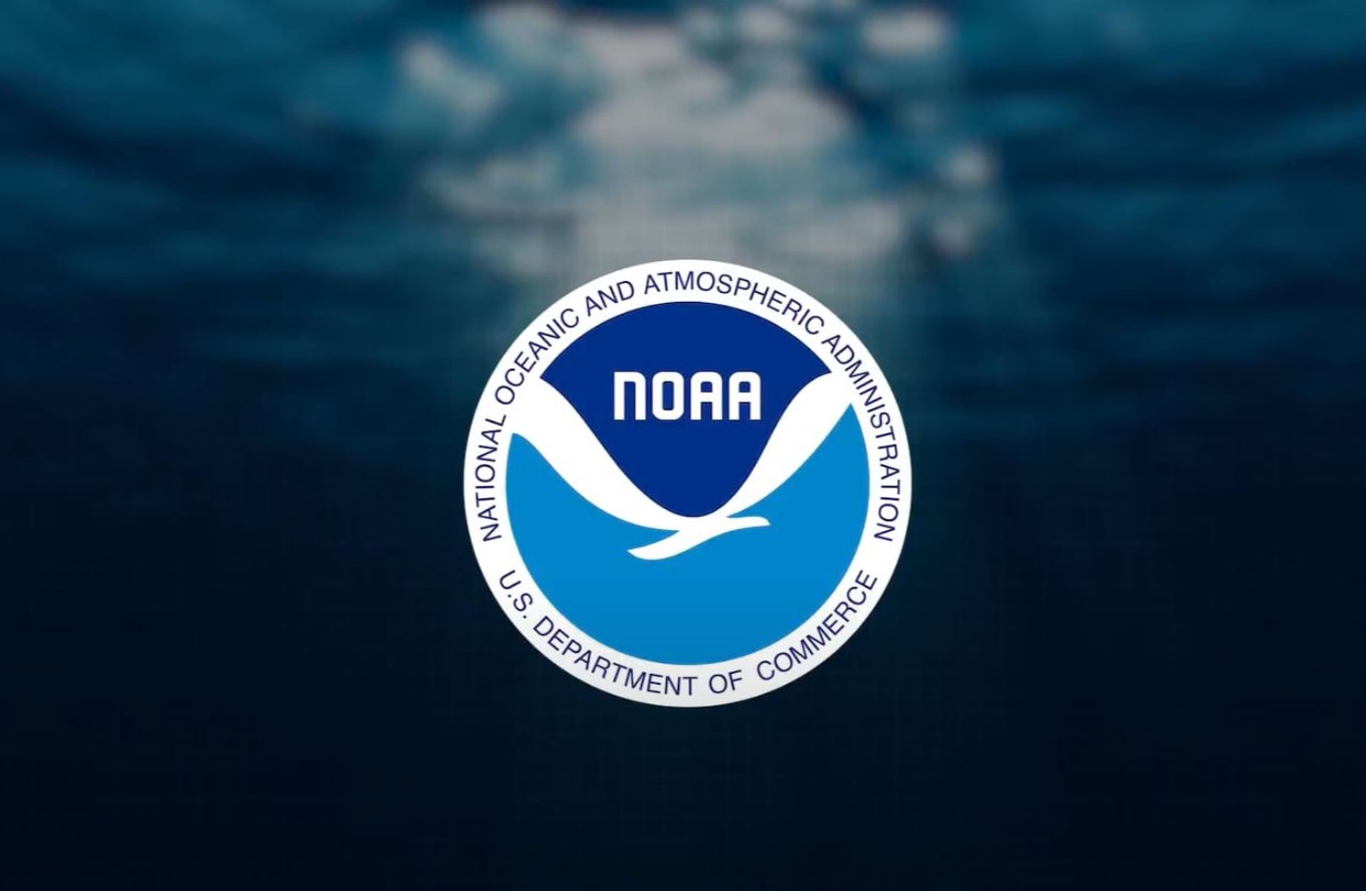 Logo for the National Oceanic and Atmospheric Administration (NOAA) against a photo of the ocean