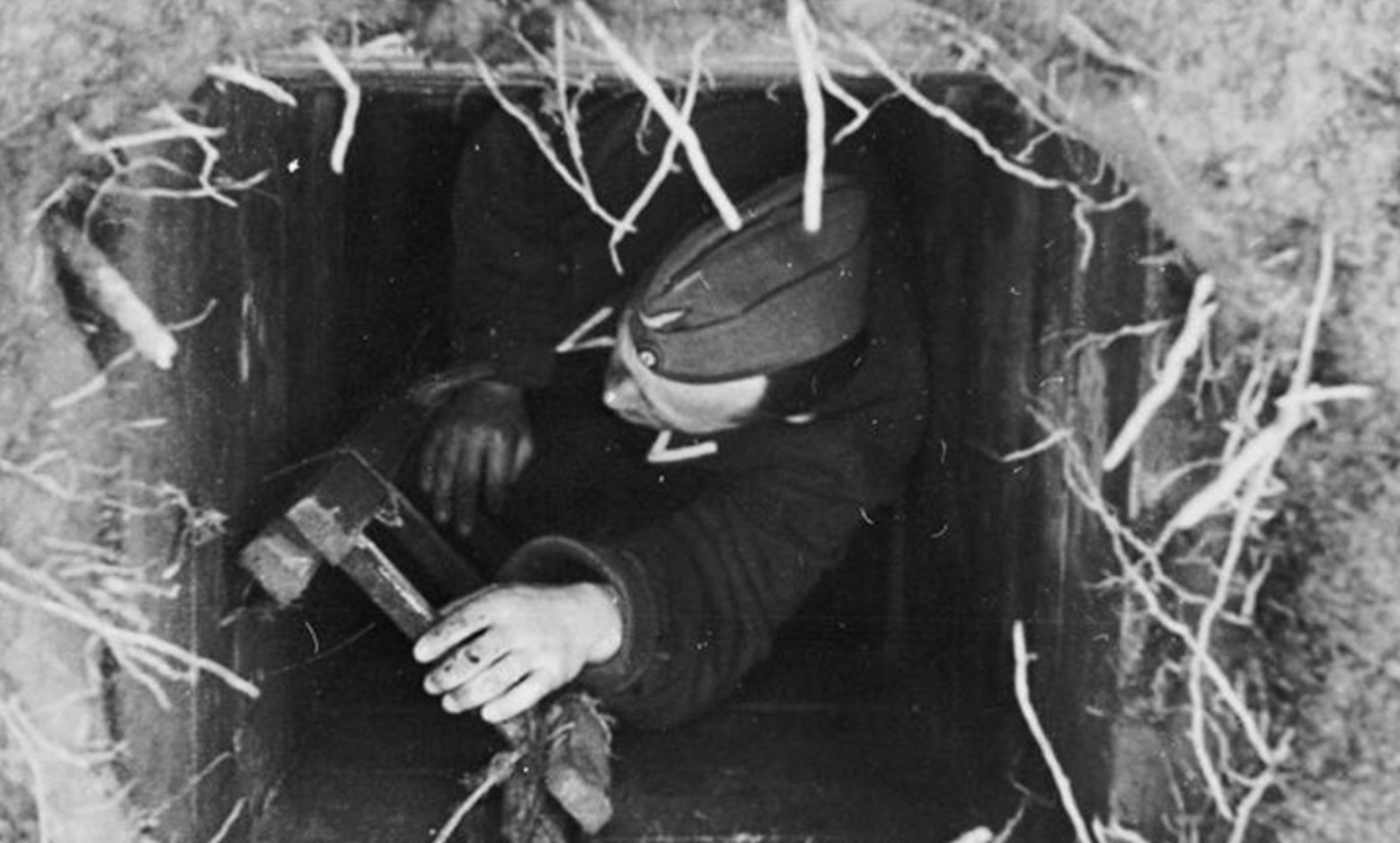 British prisoner of war digging one of the three tunnels of the Great Escape in 1943