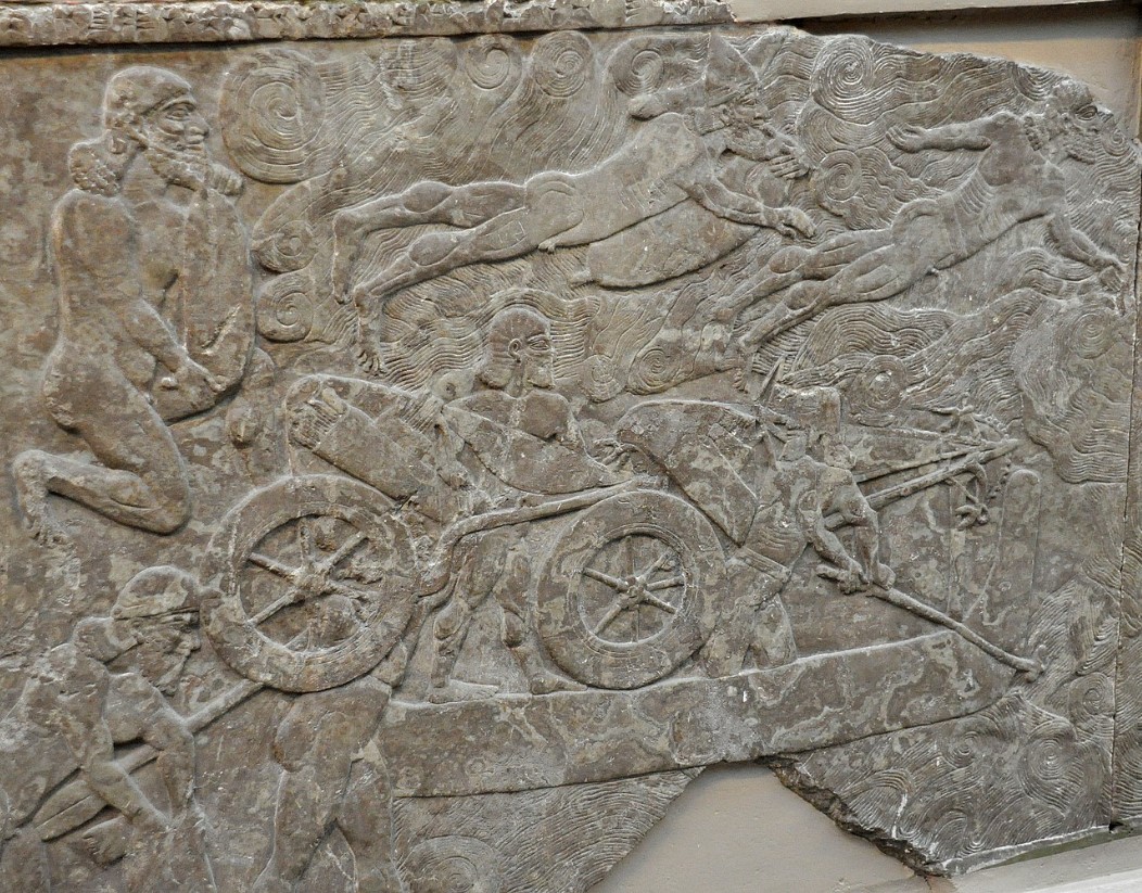 An image of several Assyrian soldiers with chariots