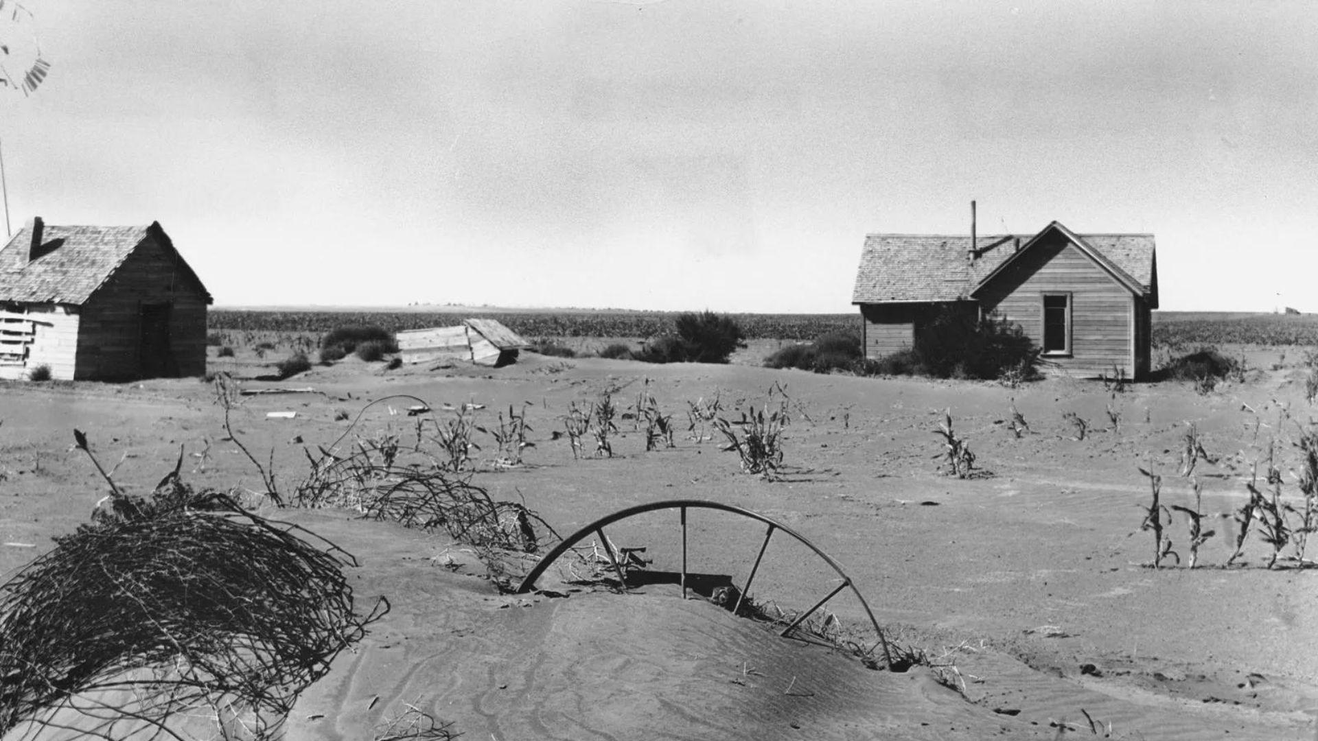 Photograph of several farm houses in the Dust Bowl during the Great Depression