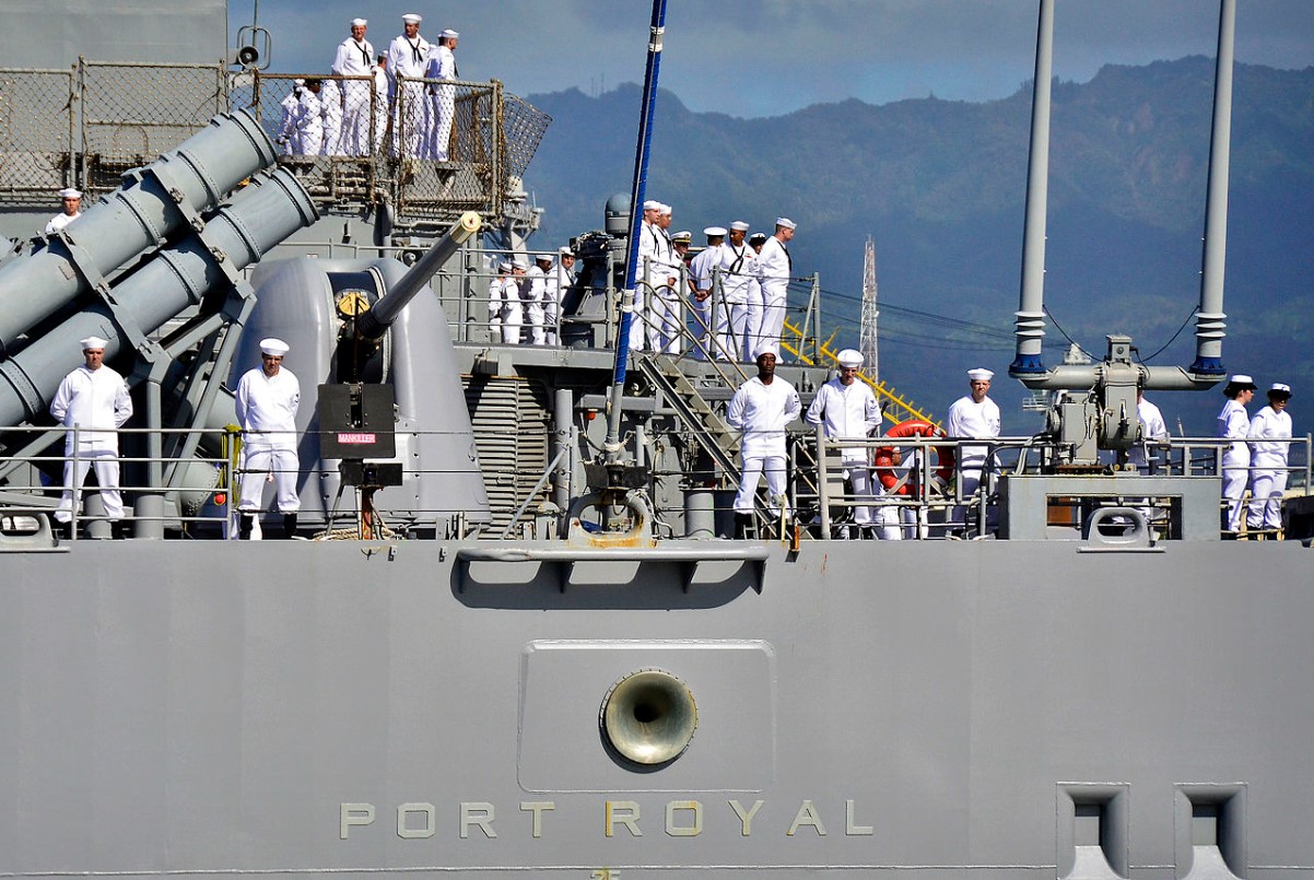 An image of several US Navy sailors aboard a ship