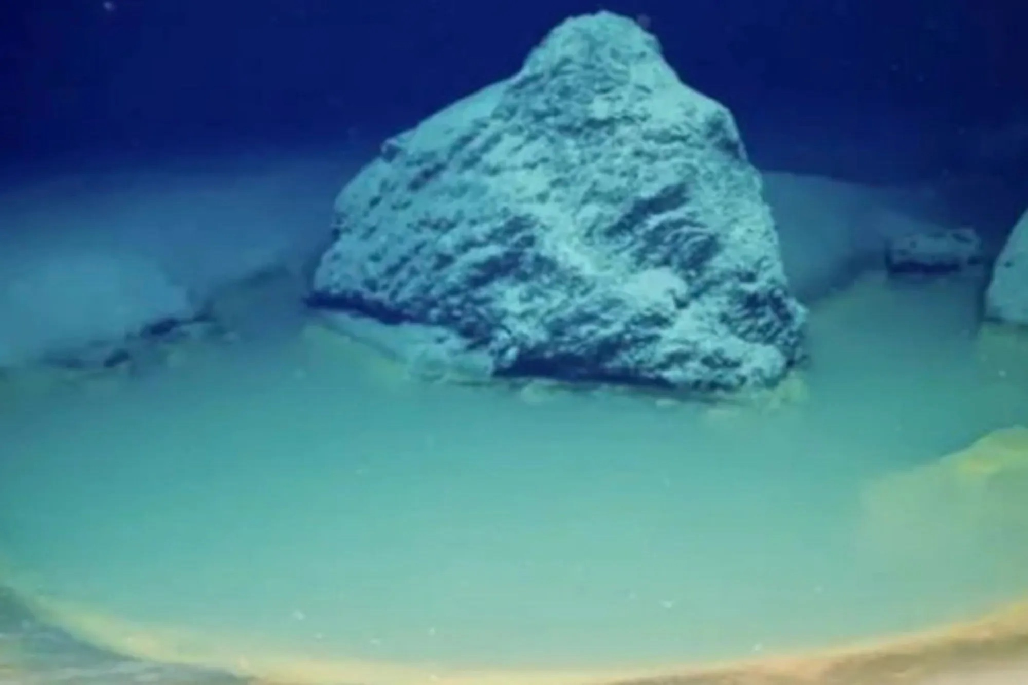 A underwater photograph of a brine pool in the Red Sea