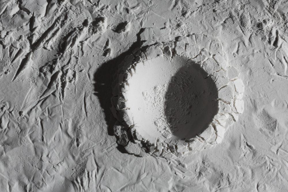 A photograph of a large crater on the moon