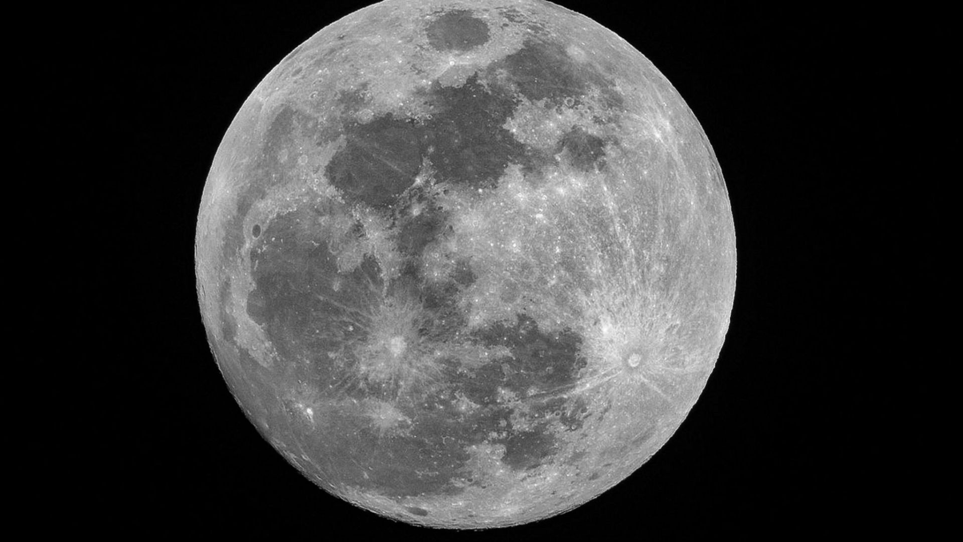 A view of the moon in black space.