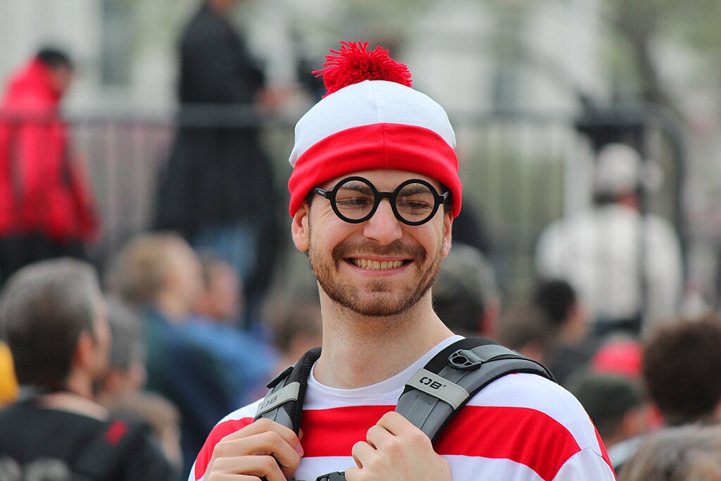 Man wearing 'Where's Waldo?' (Where's Wally?) costume, at the Reason Rally, Washington, D.C. in 2012.