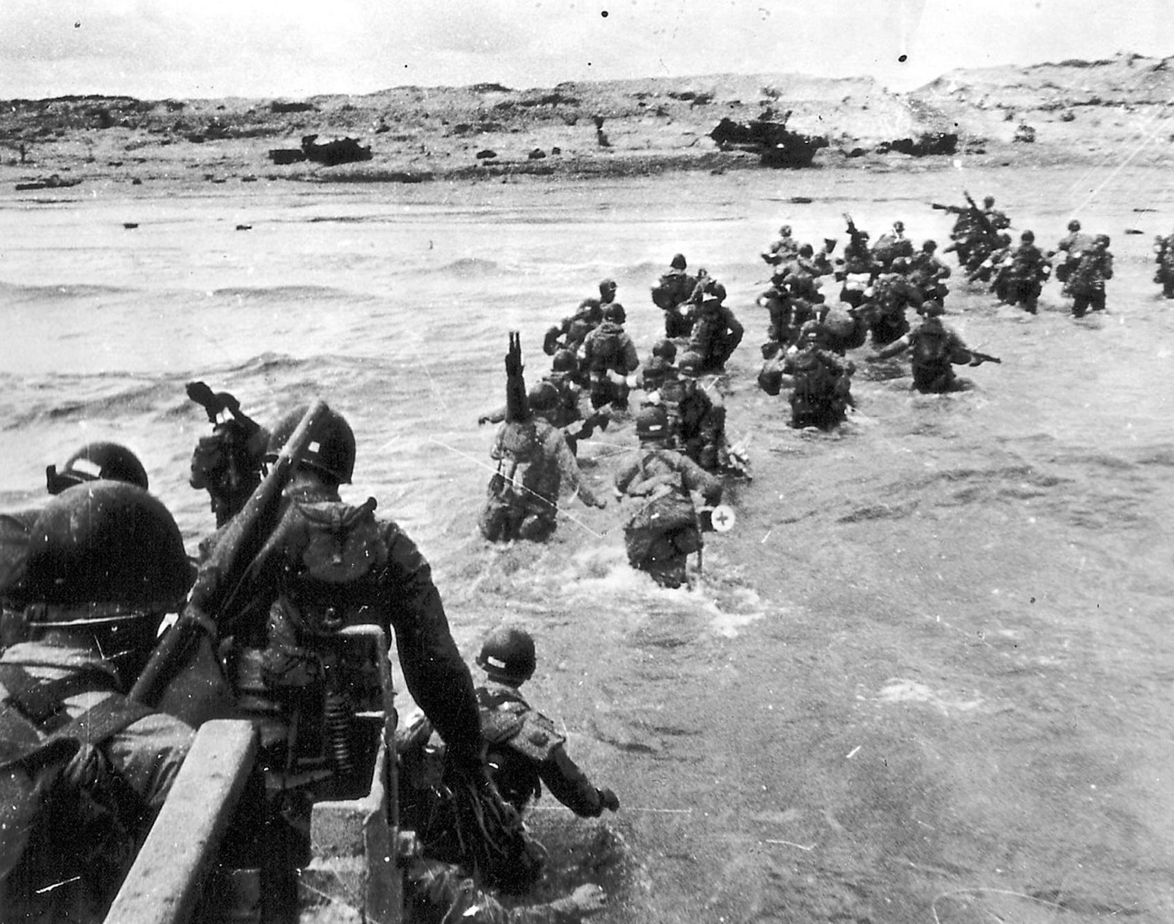 A photograph of the storming of the beach at Normandy on D-Day, June 6, 1944