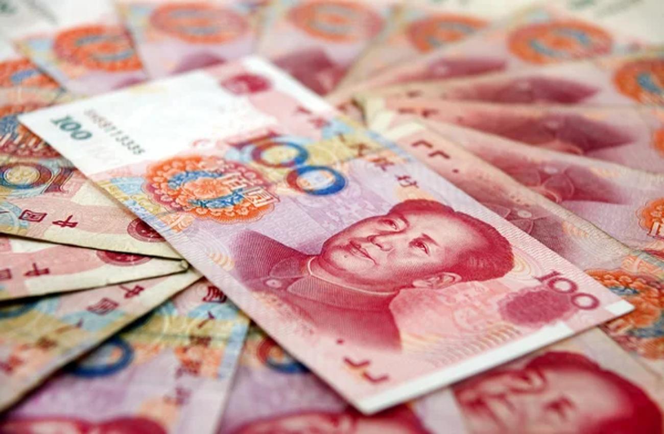 A display of Chinese Yuan where the bills are spread out in a circle