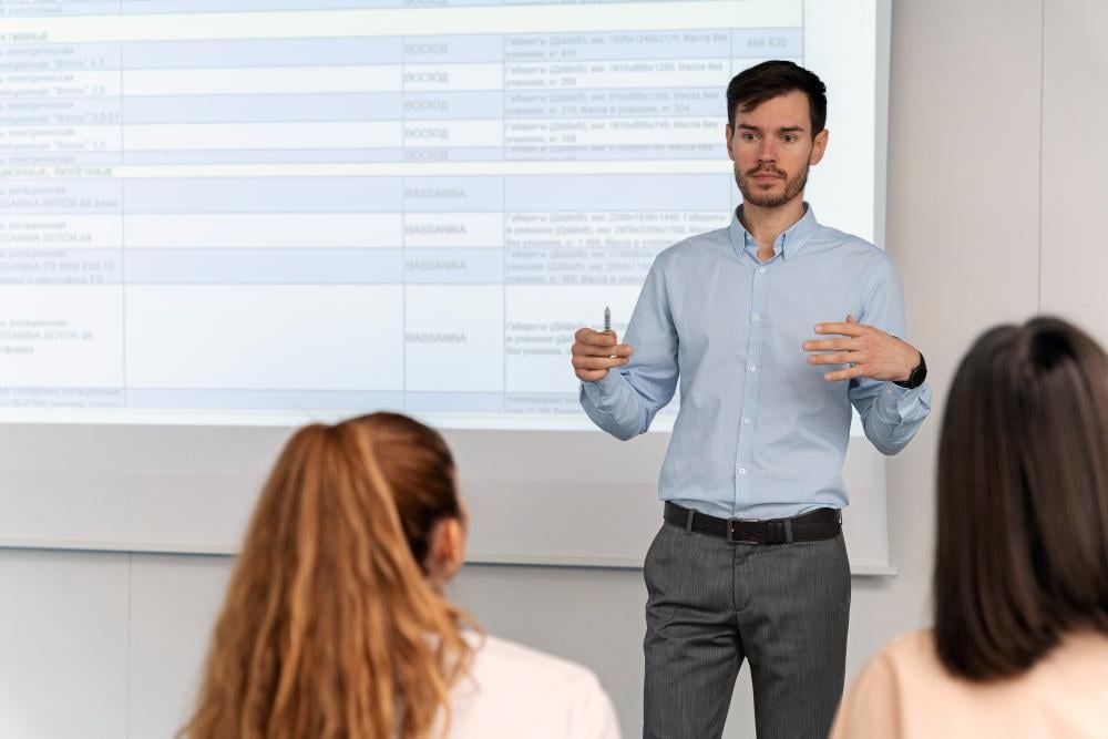 A photograph of a man giving a lecture