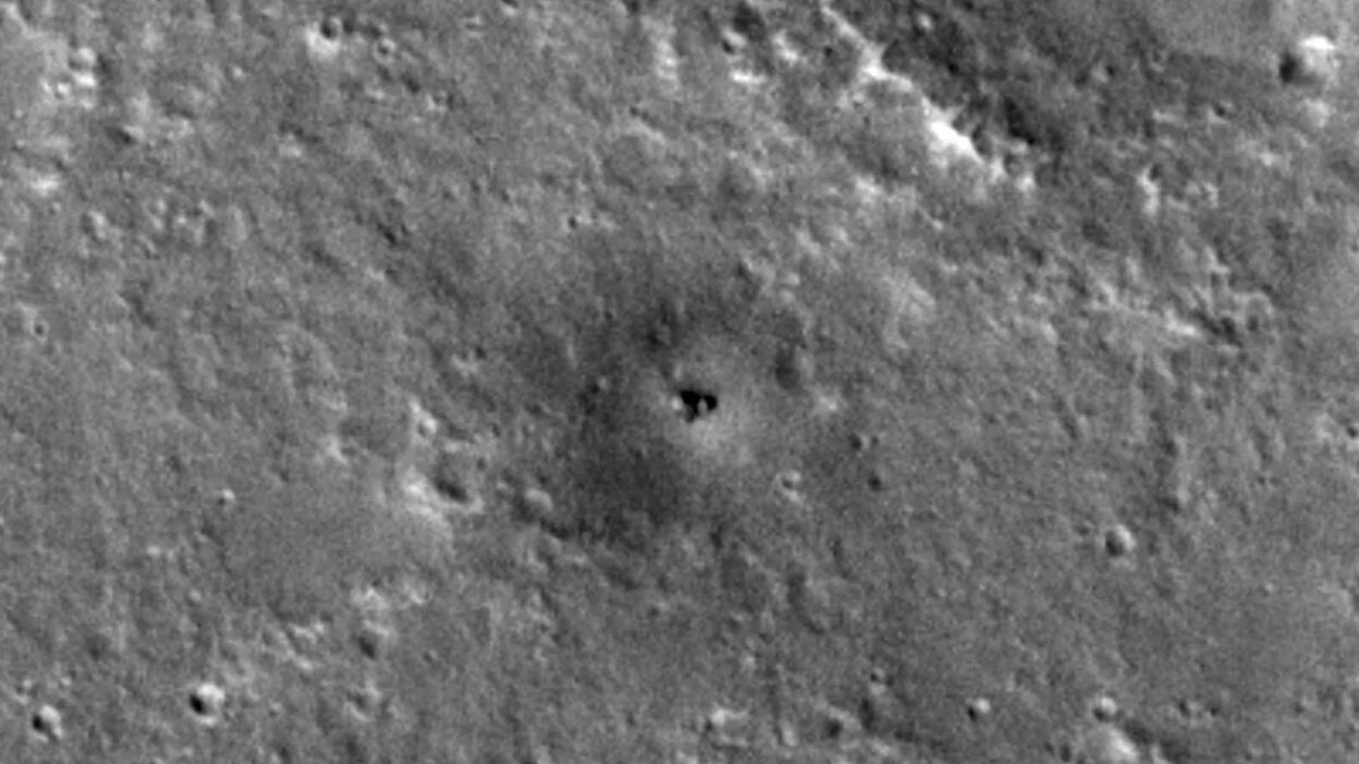 An image of the defunct InSight lander seen from a Mars orbiter in 2024.