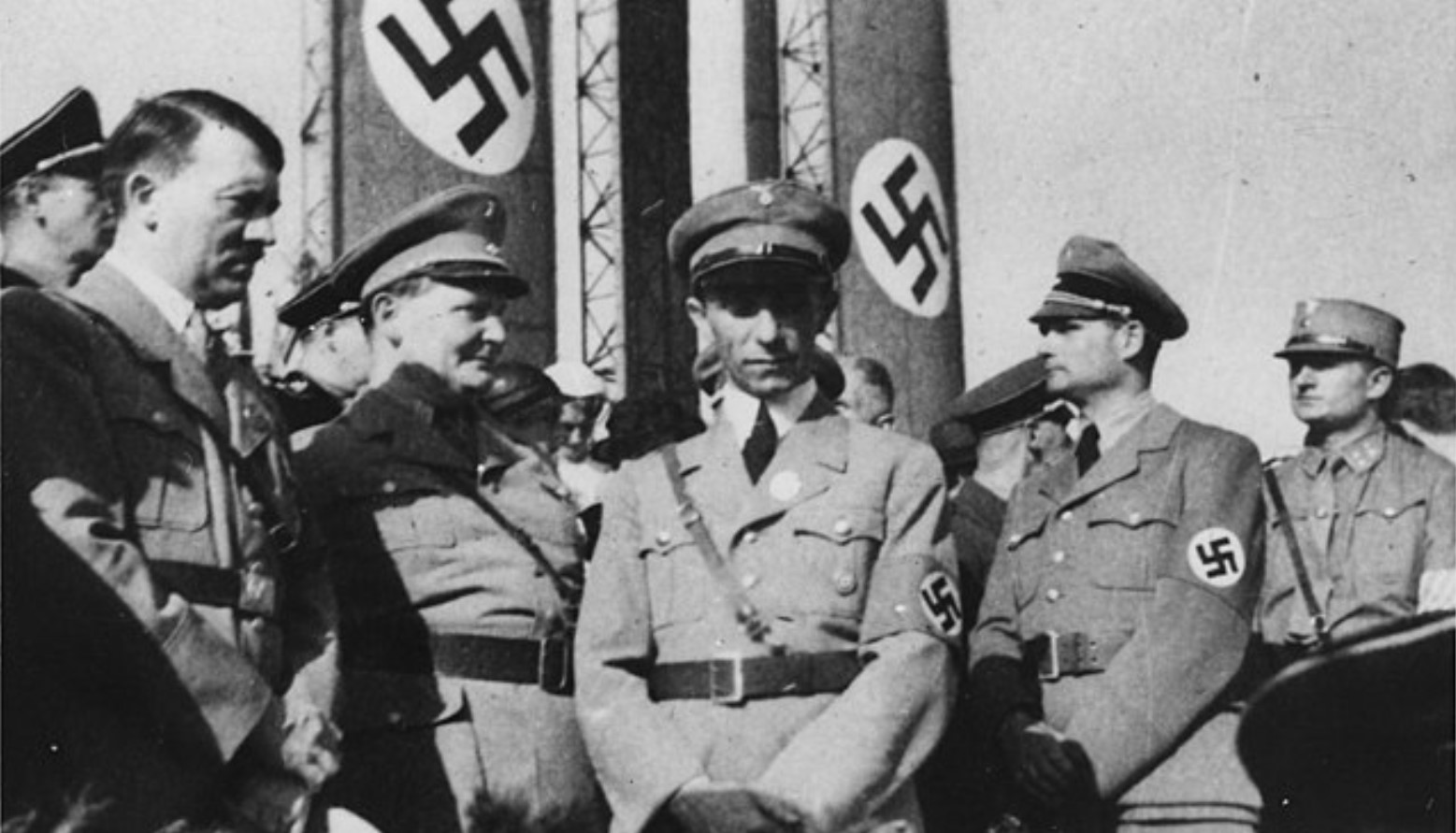 Nazi Germany in WWII. Nazi soldiers are in the image, including Adolf Hitler.