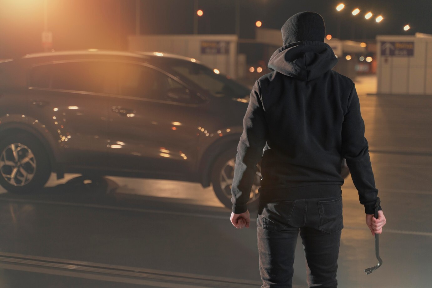 Close up of man trying to break into car