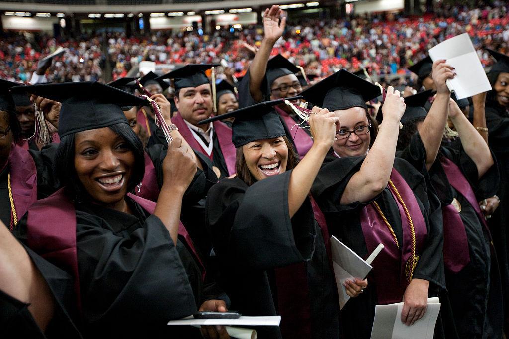 A commencement ceremony for Strayer University, a private, for-profit educational institution