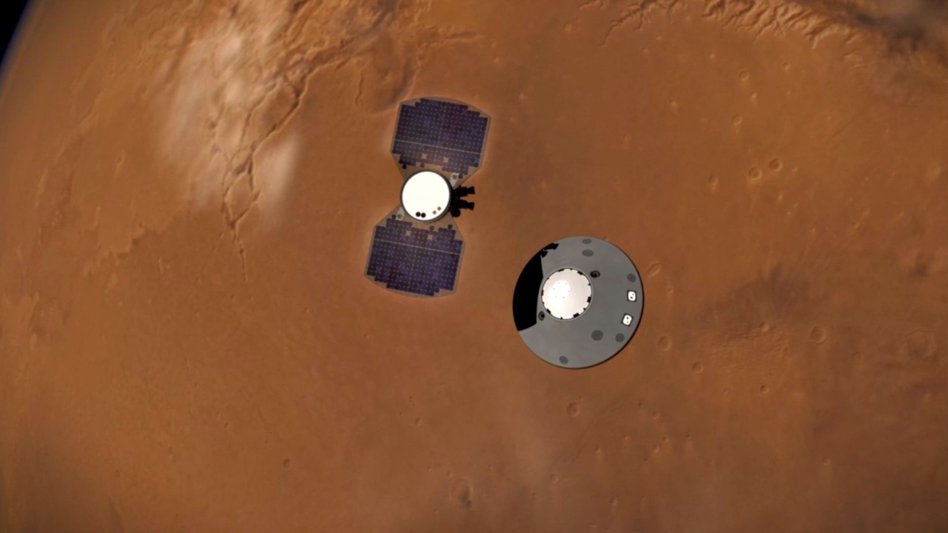 The InSight lander separates from other components as it prepares to land on Mars.