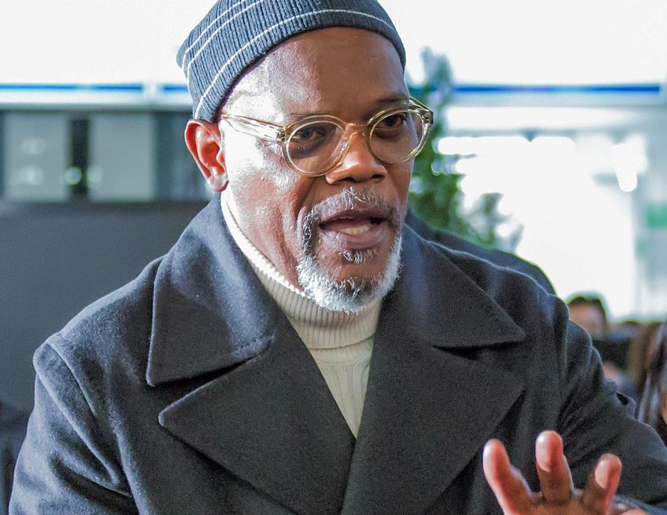 A photograph of the famous actor Samuel L. Jackson in a long coat