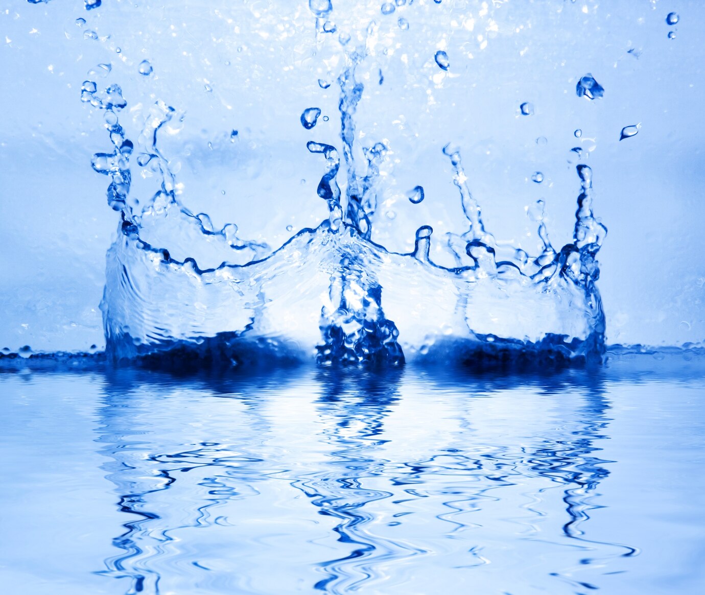 puddle of water with a splash