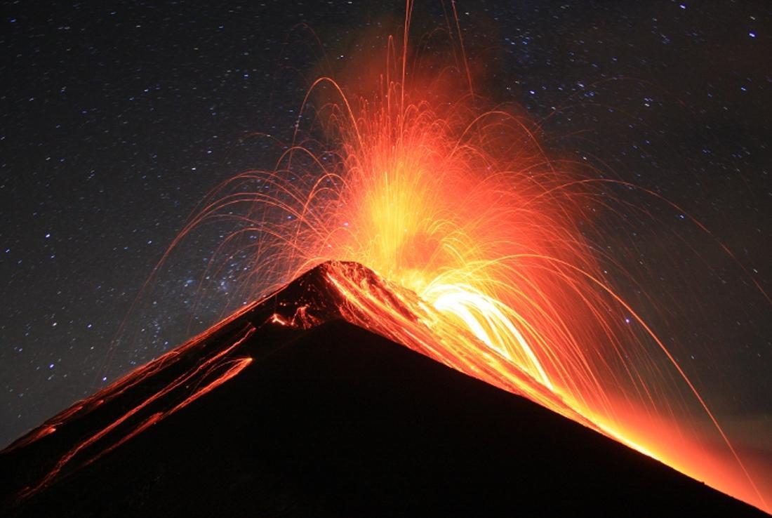 A photograph of a volcano erupting
