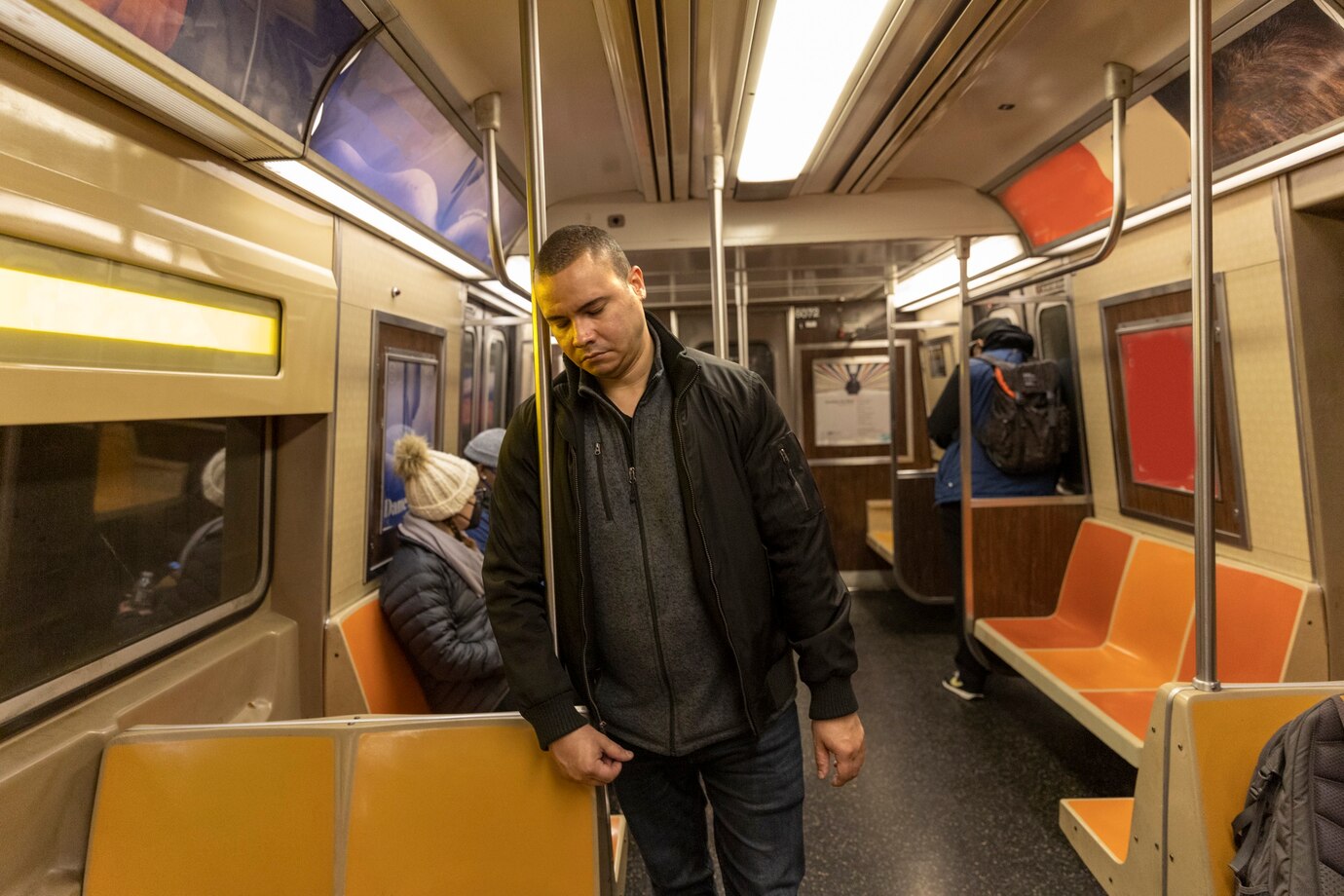 Man sleeping on subway