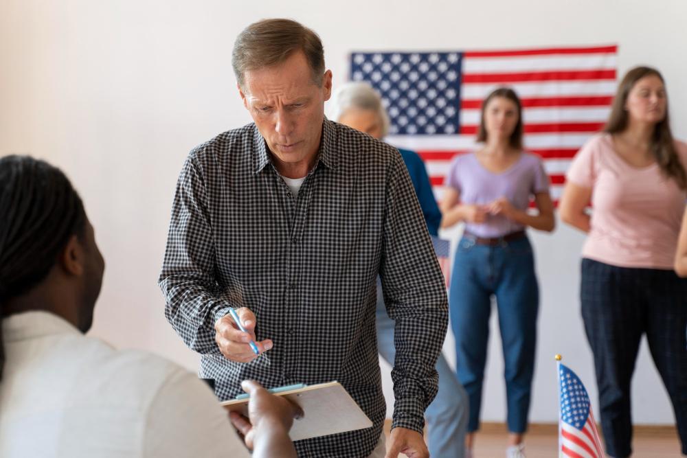 A photograph which depicts several Americans voting