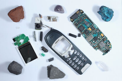 A stripped down mobile phone and mobile phone parts lie on a table with minerals representing substances typically found in a mobile phone, including (from top L) bauxite, from which aluminum is derived, a lepidolith mineral that contains lithium, a chalkopyrit mineral that contains copper, a piece of quartz that contains silicon, a piece of bituminous shale, from which plastic is derived, and chunk of magnetic iron at a press conference for a German government intiative to recycle mobile phones on August 28, 2012 in Berlin, Germany. The inititative, which is called: "The Resources Expidition: Discover, What's In Your Mobile Phone!" ("Die Rohstoff Expidition: Entdecke, was in [d]einem Handy steckt!") will furnish schools nationwide with learning materials and a box of mineral samples in an effort to encourage schoolschildren to recycle their old mobile phones.  