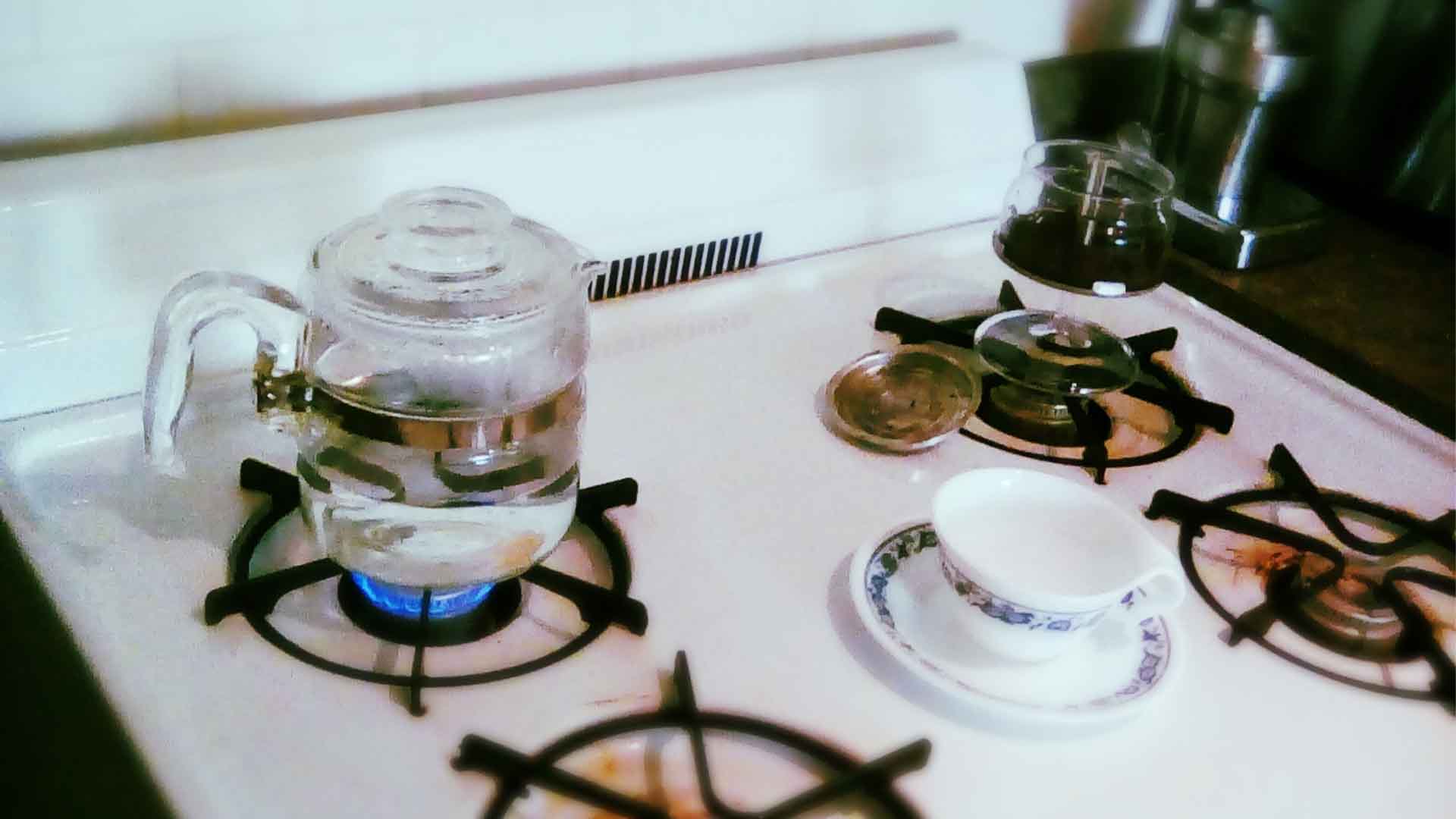 Glass percolater on stove burner with natural gas
