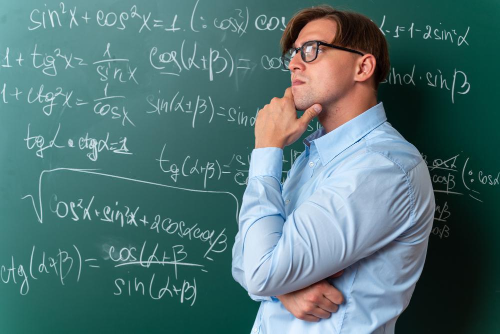 A photograph of a man thinking about an equation