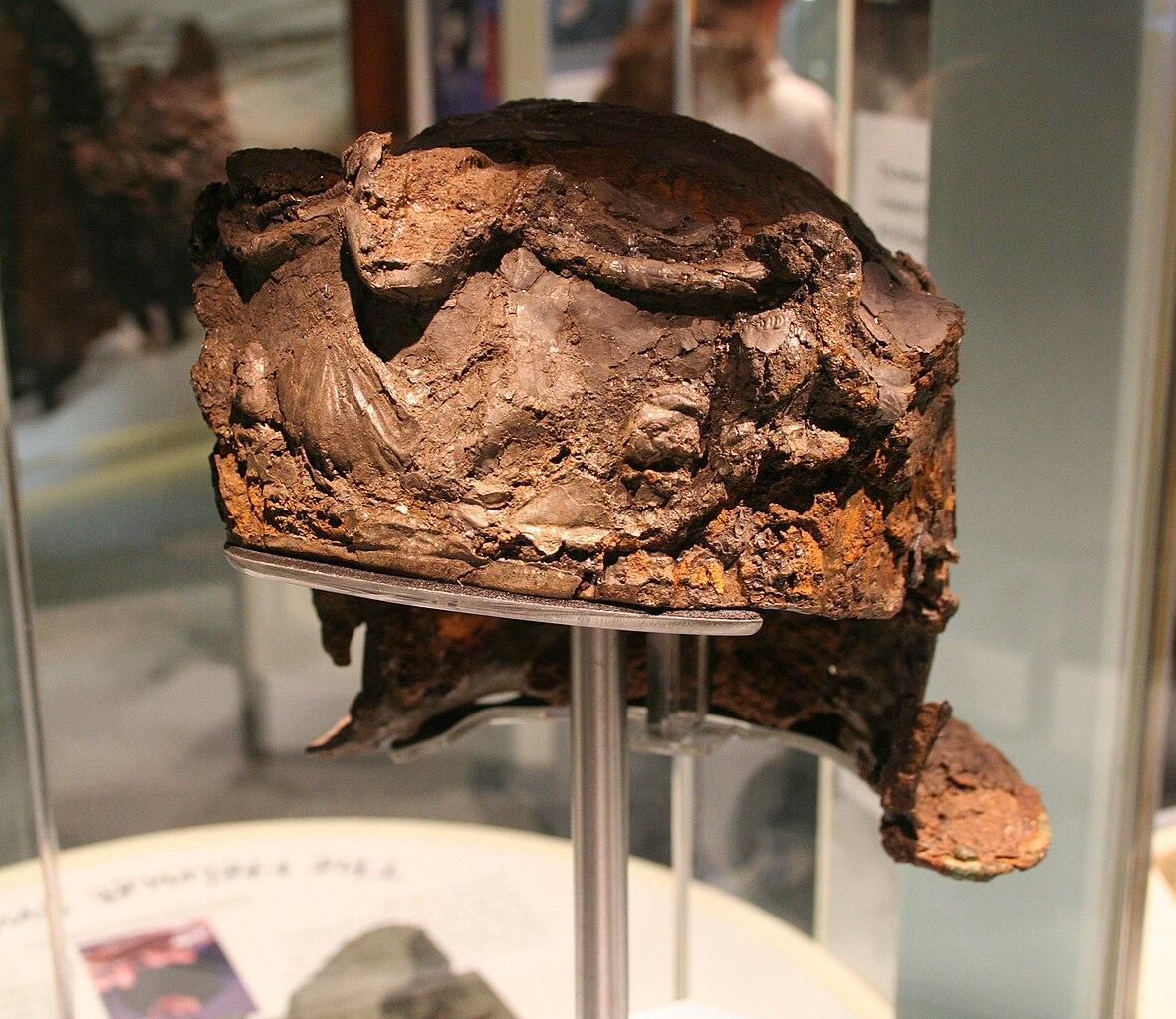 A photograph of the Hallaton Helmet on display