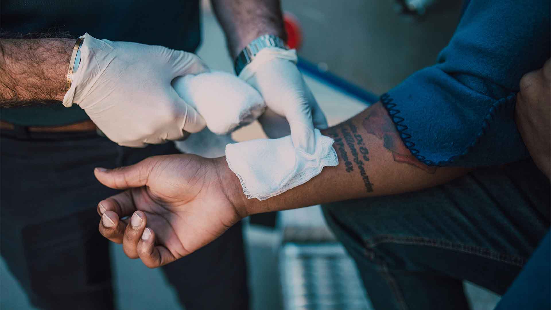 Person With White Bandage on right Hand