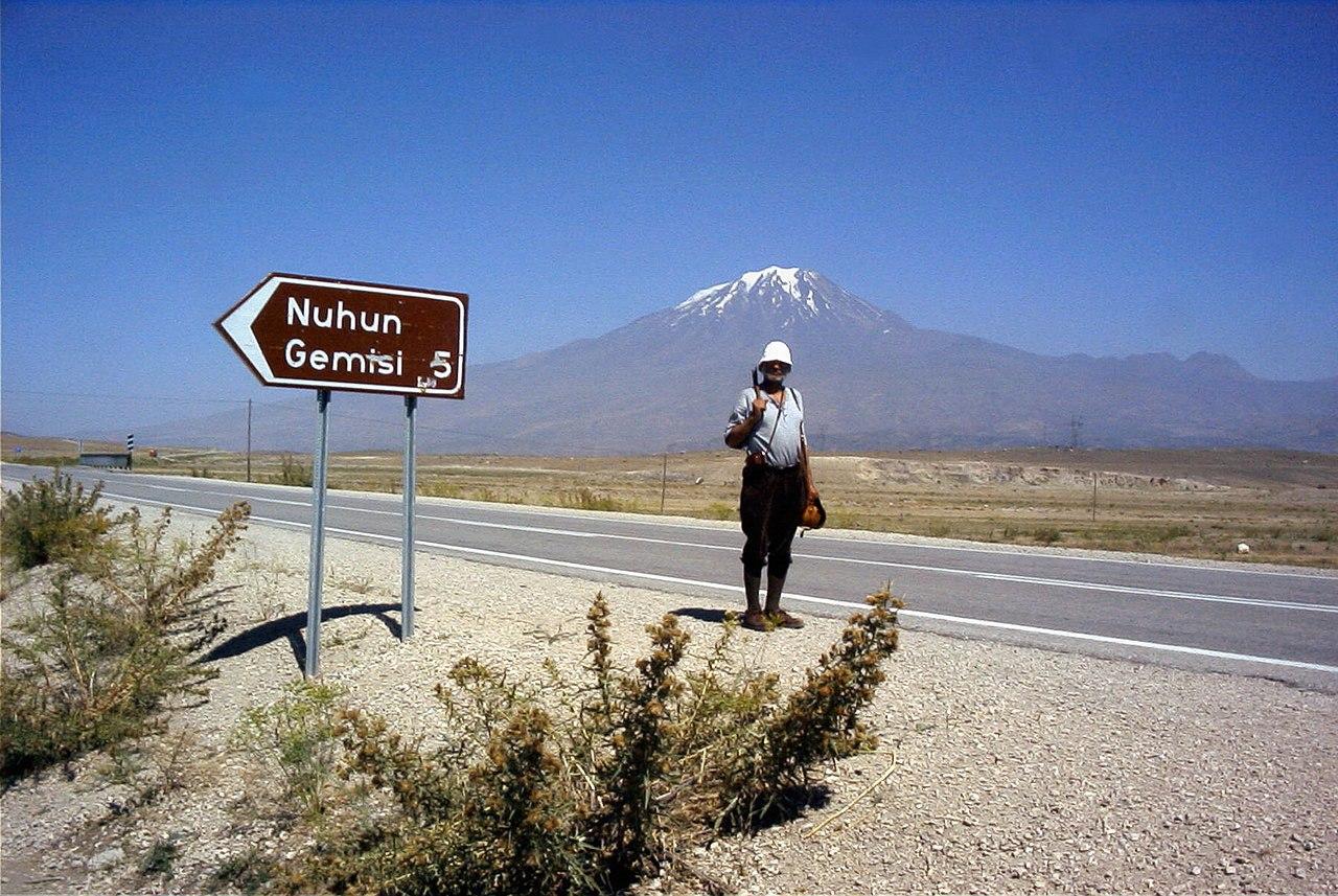 A man is pictured standing next to a road sign not far from the Durofeiner Formation
