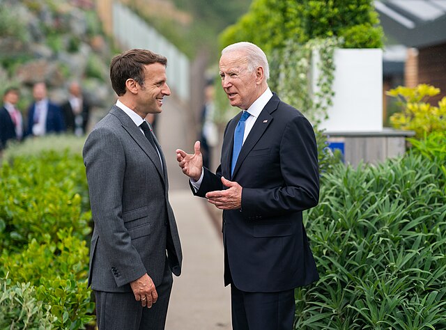 Macron and Biden conversing