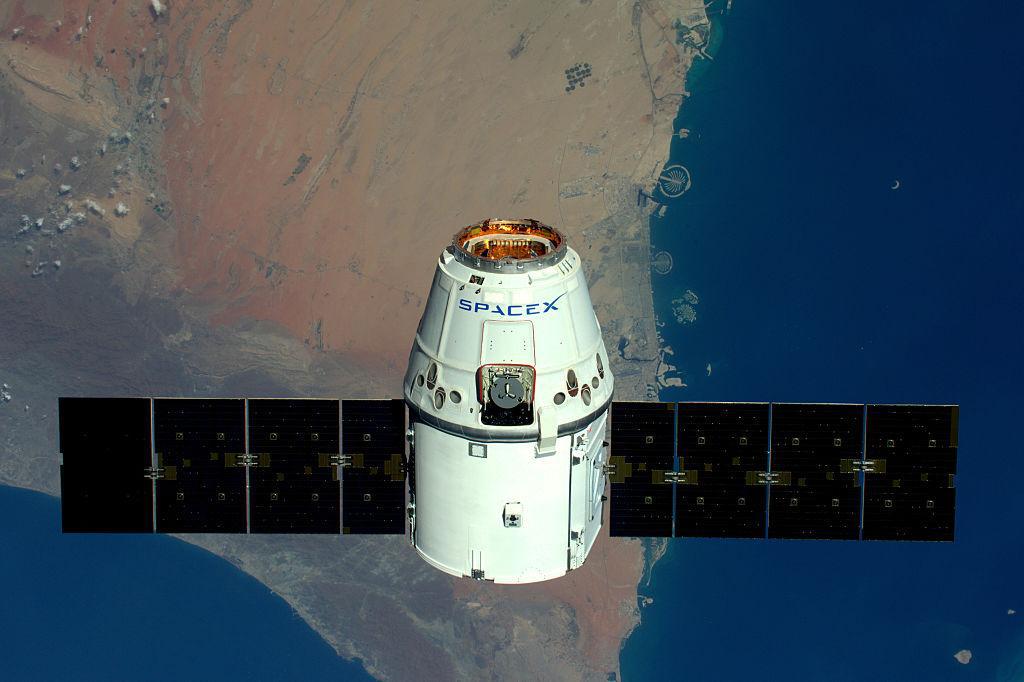 A photograph of a spacecraft leaving Earth