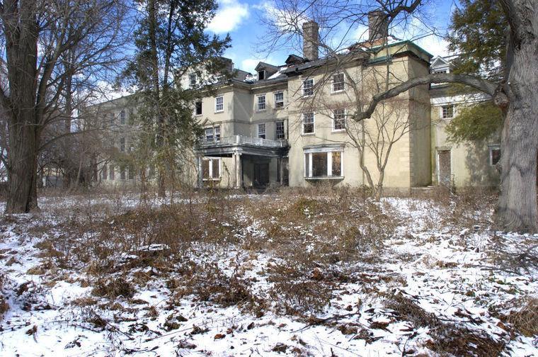 A photograph of the McNeal mansion taken close to the front entrance
