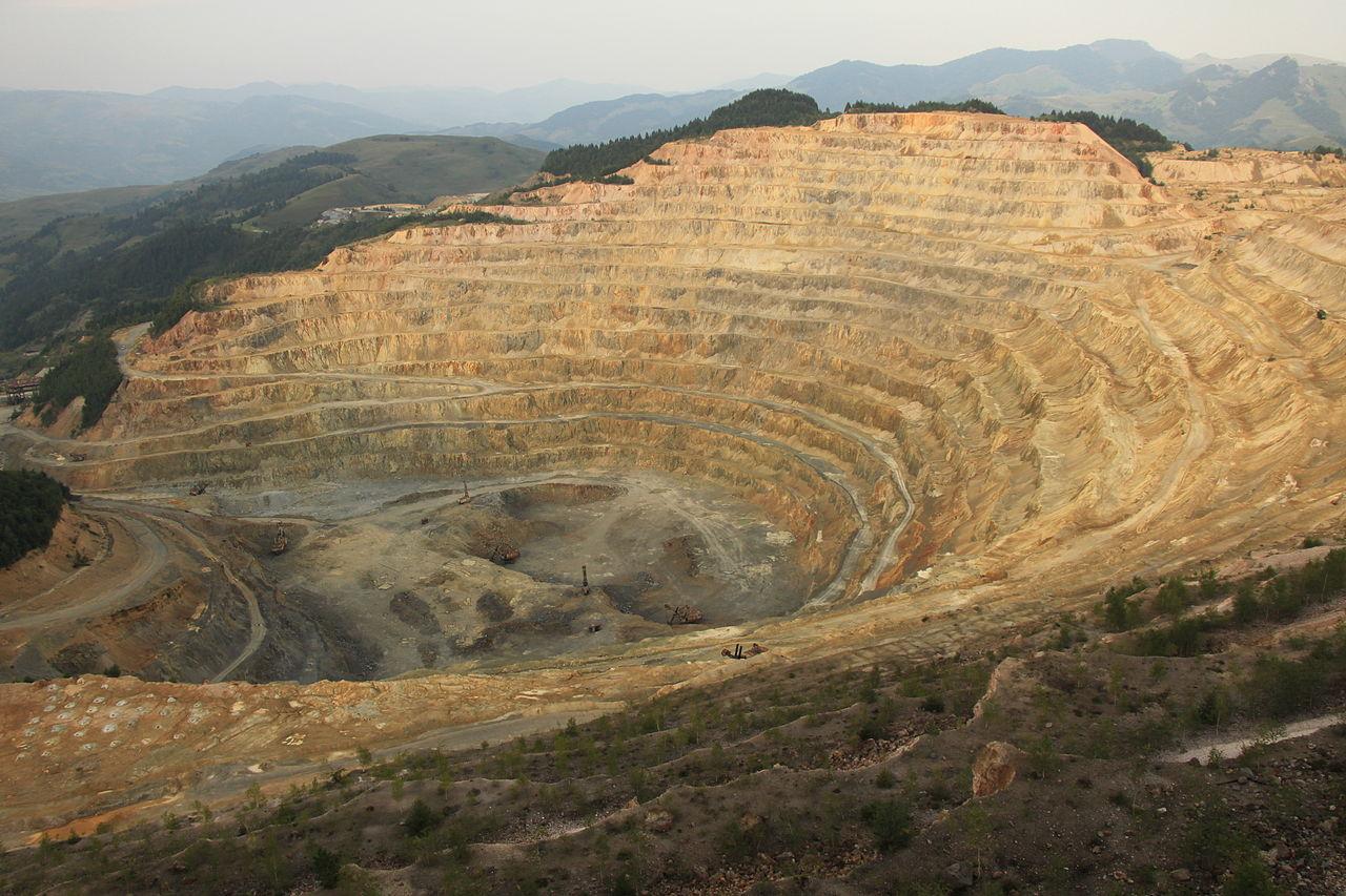 A photograph of a large copper mine