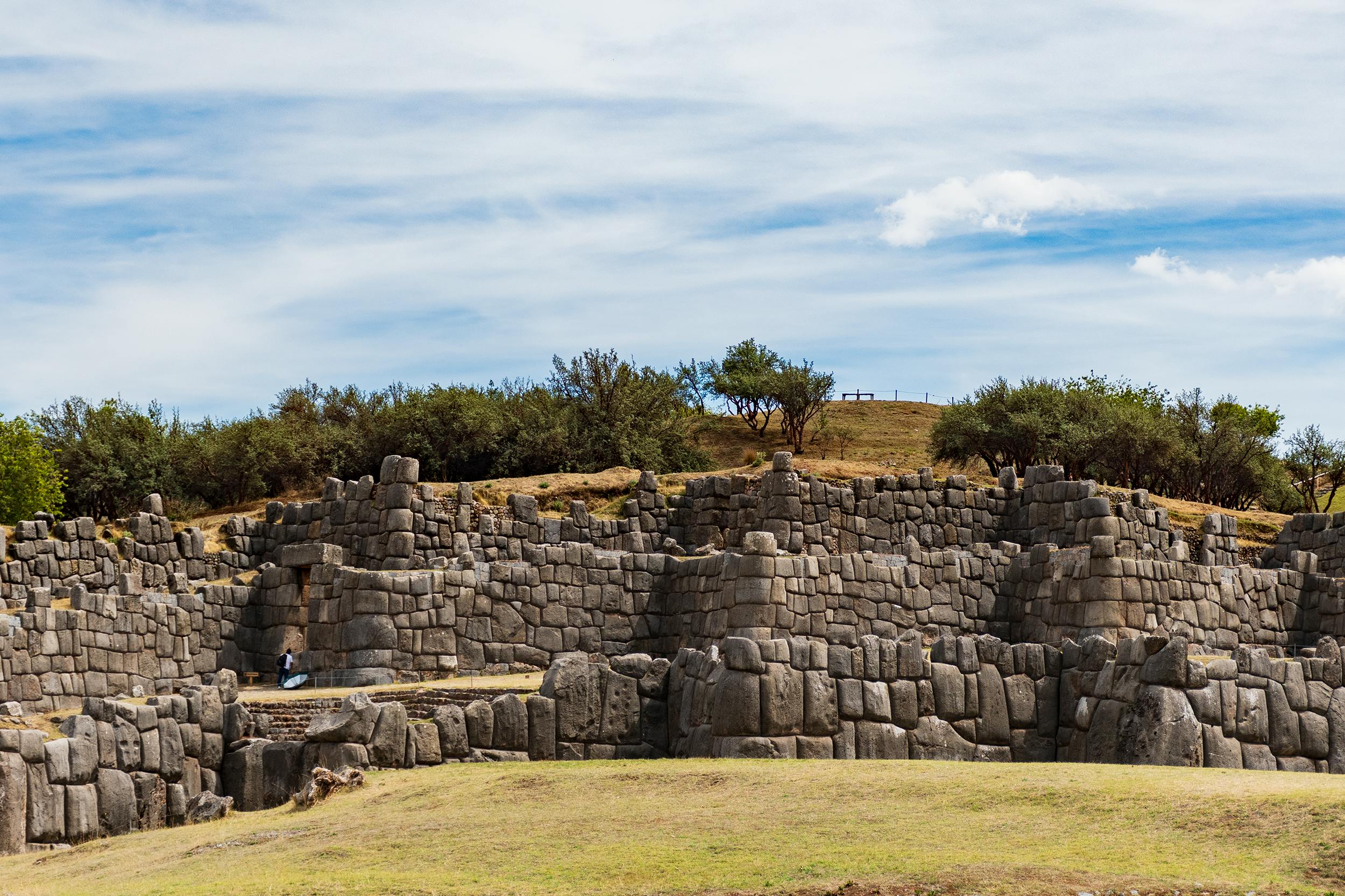 A wideshot of the ruins of Sacsayhauman