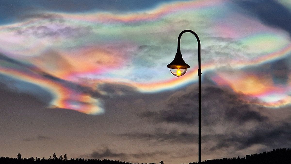 Iridescent, rainbow-colored clouds, known as polar stratospheric clouds, have been spotted across the Arctic for days on end.