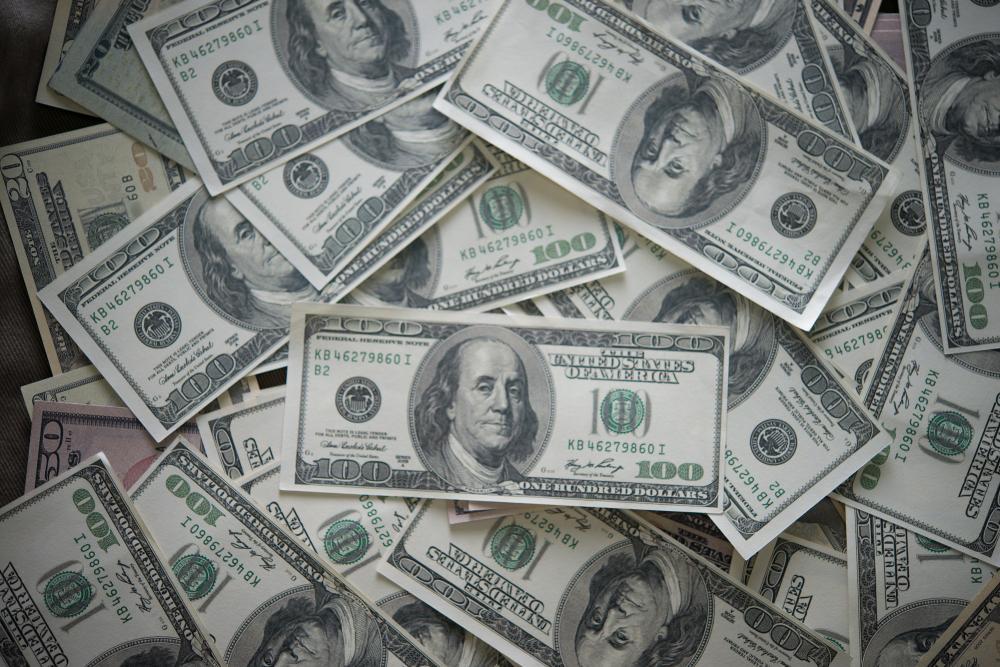 A photograph showcasing a large amount of American cash