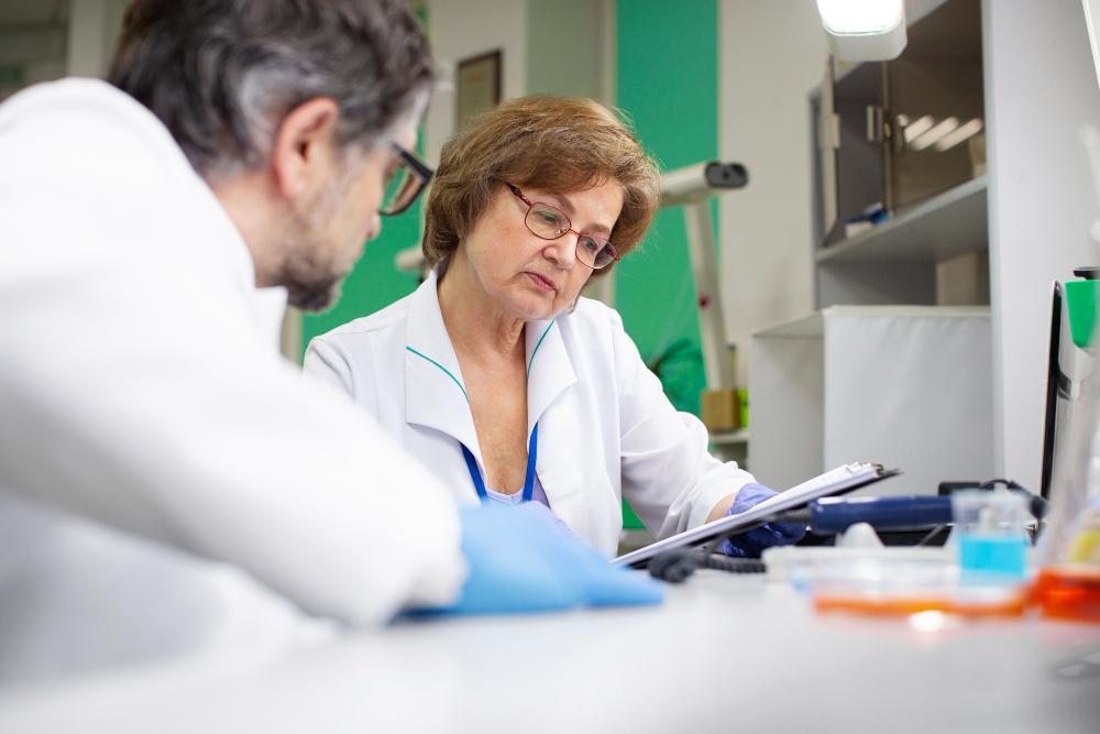 A photograph of several scientists working in their lab