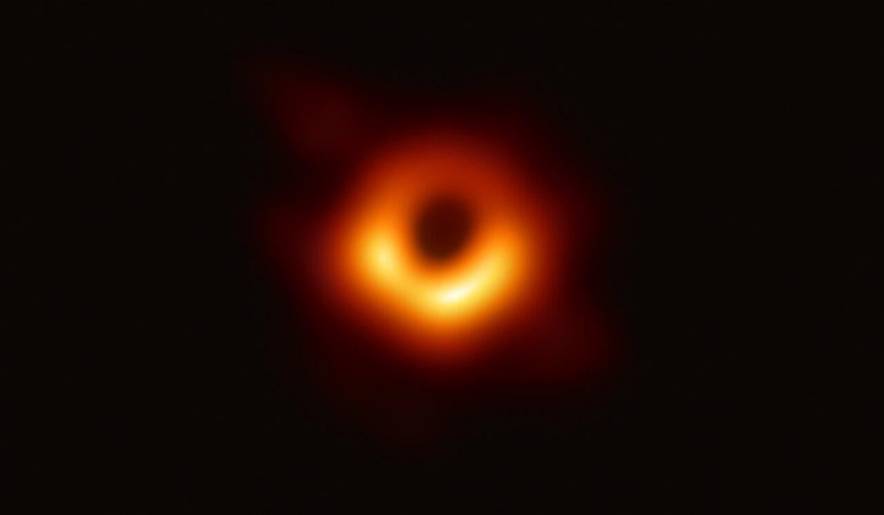 A photograph of a black hole in deep space