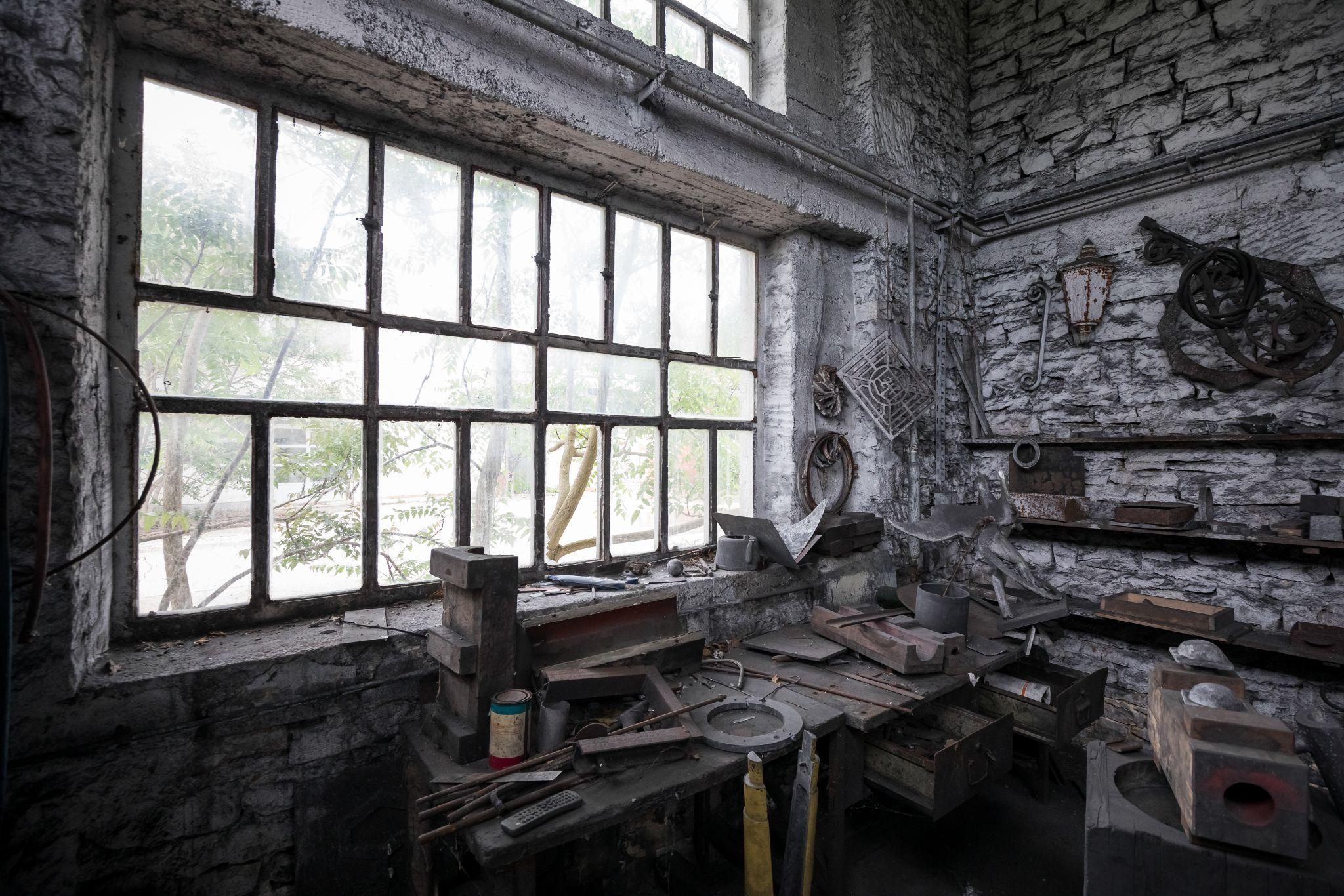 A photograph showcasing the ruined state within an abandoned home