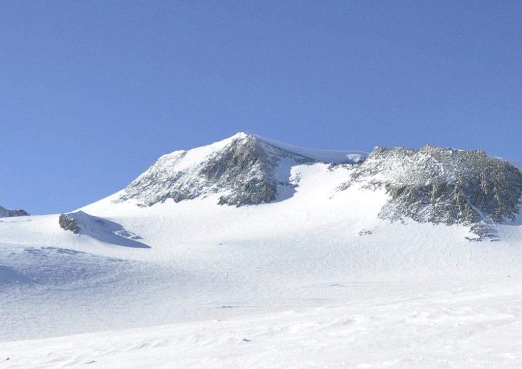 A photograph of a large mountain in Antarctica