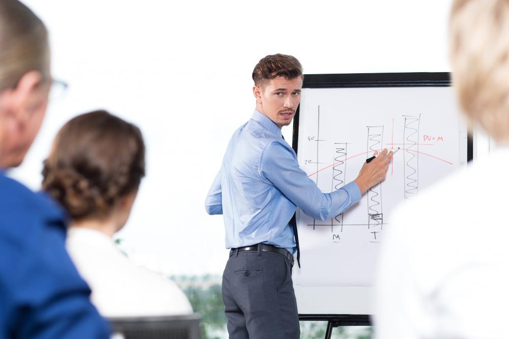 A photograph of a researcher giving a presentation